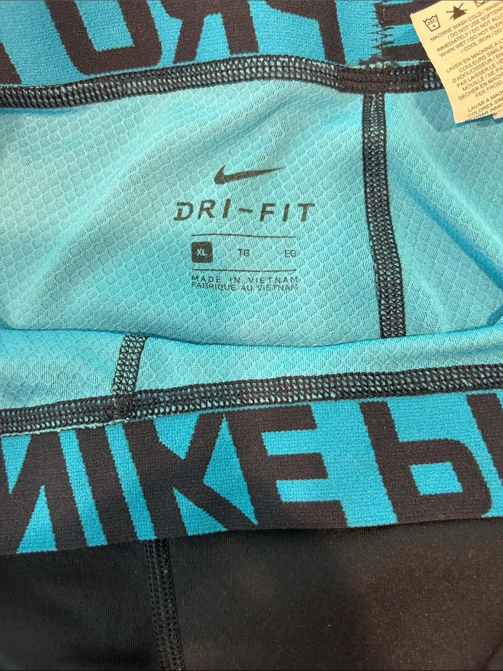 Nike Black Compression Leggings with Blue Logo and Waistband